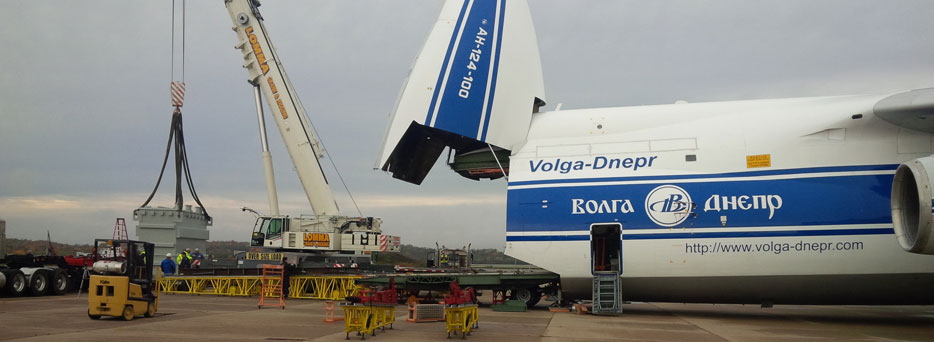 Crane Being Loaded into Plane